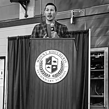 A speaker at a Walk for Mental Health event at Mount Boucherie Secondary School